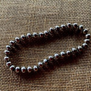 HAND RUBBED AND CRAFTED BEAD STERLING SILVER BRACELET